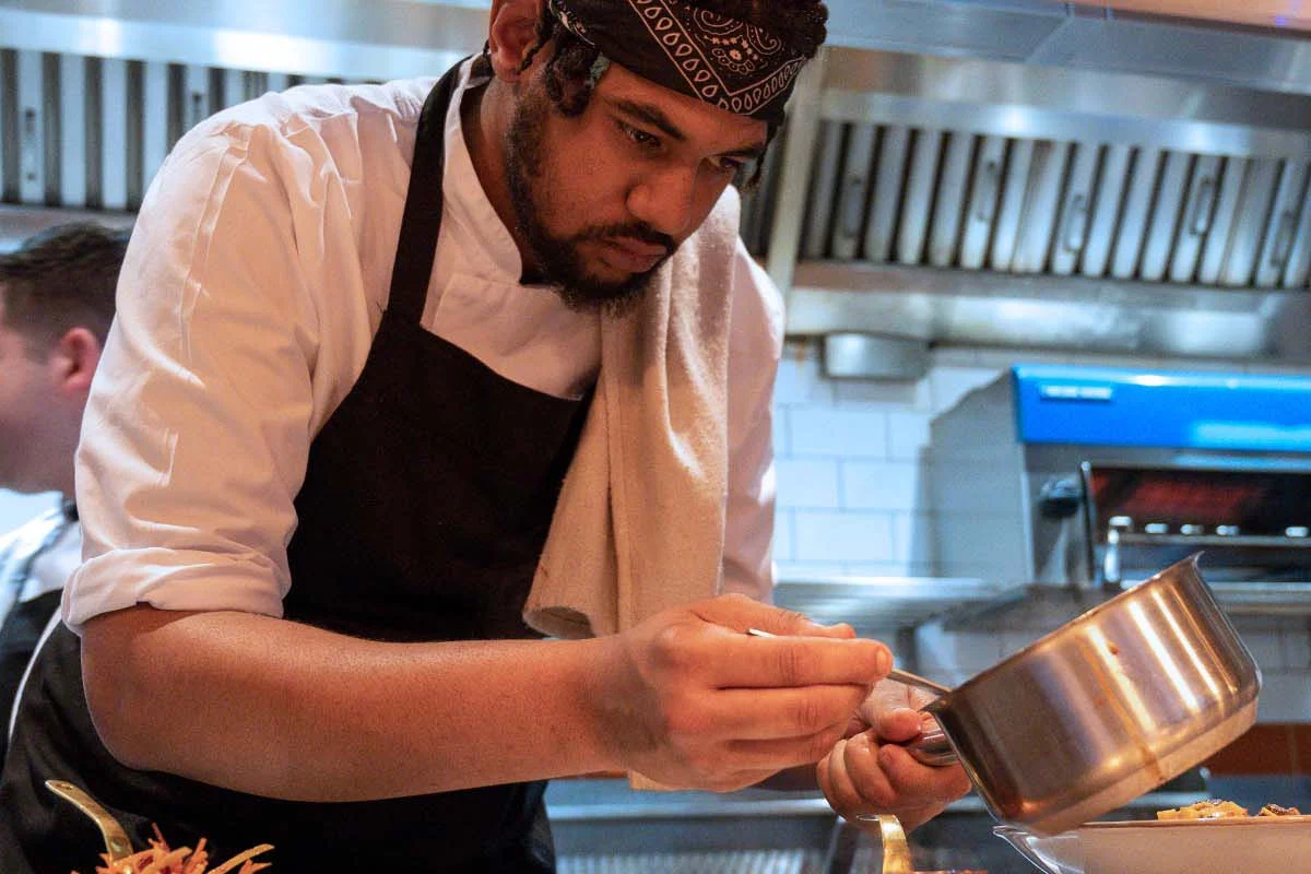 Chef-Plating-Food-At-American Southern Soul Food Restaurant in Haymarket